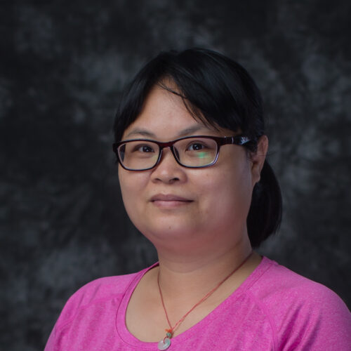 Portrait of Siping Huang, Office Support staff at Clifford International School in Panyu, Guangzhou, China