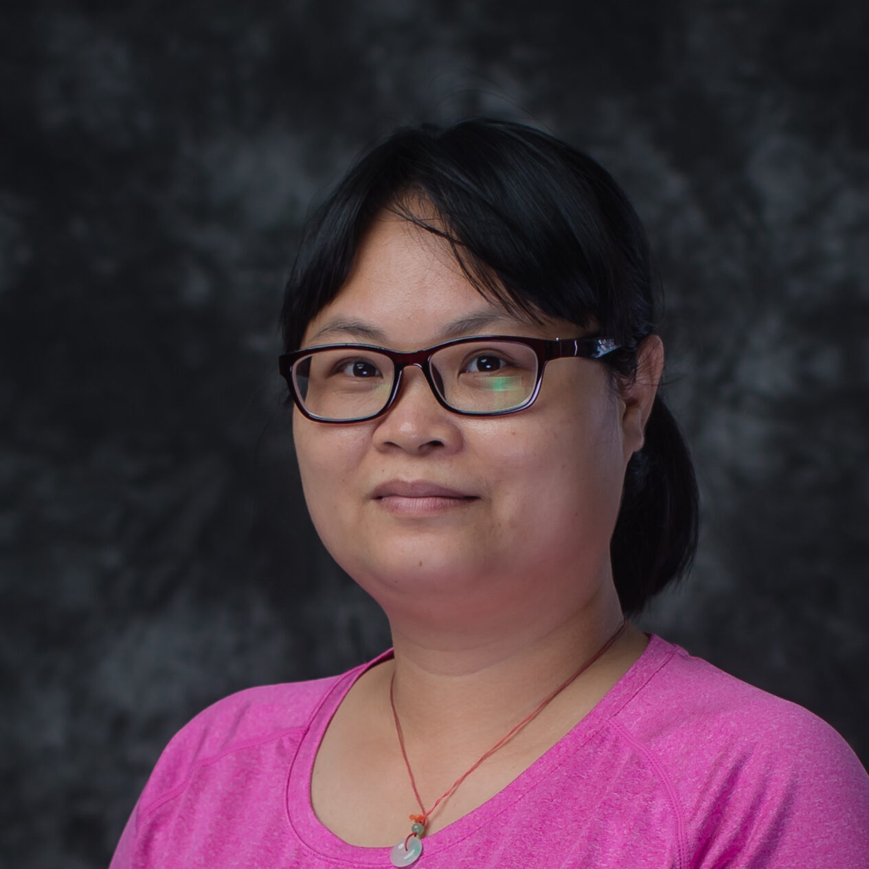 Portrait of Siping Huang, Office Support staff at Clifford International School in Panyu, Guangzhou, China